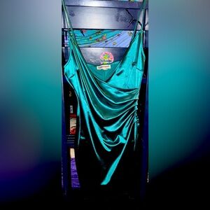 Green form fitting dress